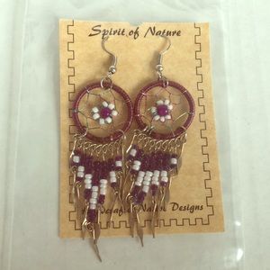 Handcrafted dangle earrings with beading